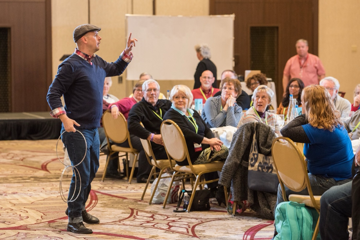 Matt Adams performing for a seated crowd